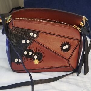 Loewe Brown and Black Crossbody Bag with Sunburst Design